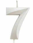 Silver birthday candle in the shape of a number "7"
