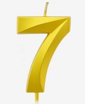 Gold birthday candle in the shape of a number "7"