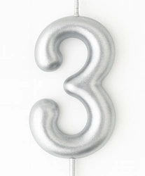 Silver birthday candle in the shape of a number "3"