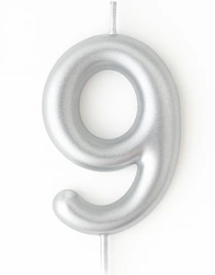 Silver birthday candle in the shape of a number "9"